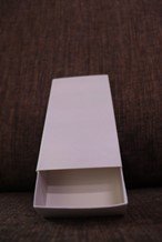 Custom printed slide box packaging 12cm x 7cm x 5cm by Allayal Printing Qatar